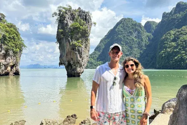 Tourists visiting James Bond Island on a speedboat tour from Phuket