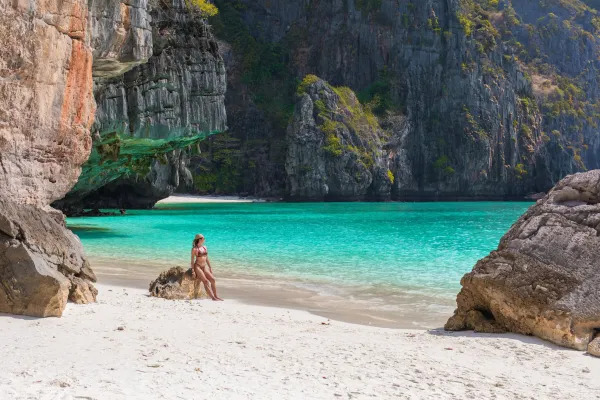 Tropical Phi Phi Island beach and limestone cliffs on a snorkeling and scuba diving tour from Phuket